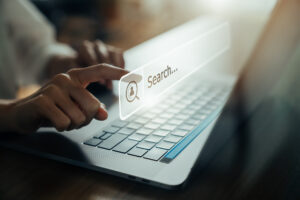 a photo of someone's hands typing on their keyboard